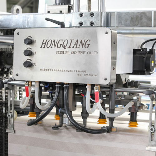 Automatic paper feeder and edge-stitching mechanism